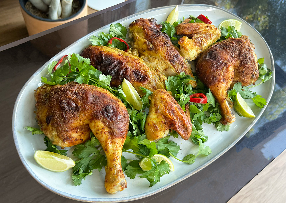 Curry Roasted Chicken served on a platter.