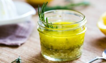 Citrus vinaigrette stored in a mason jar.