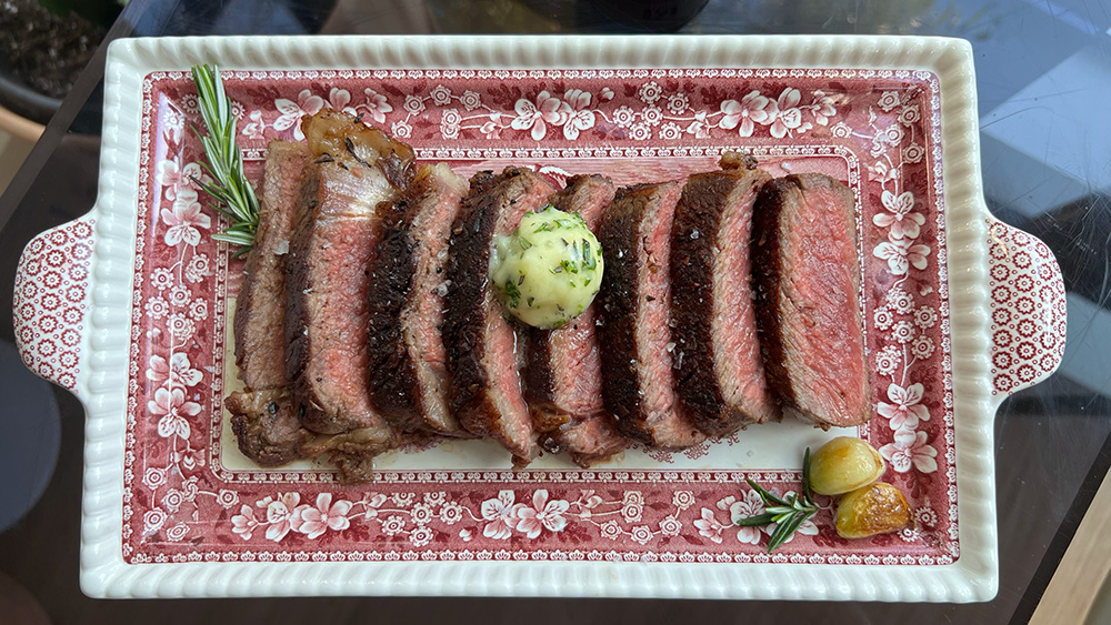 Bone-in Ribeye with Herbed Garlic Butter.